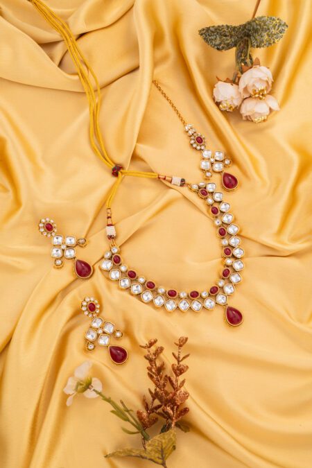 Maroon Mosiannate on String type Gold Kundan set, fit for all occasions