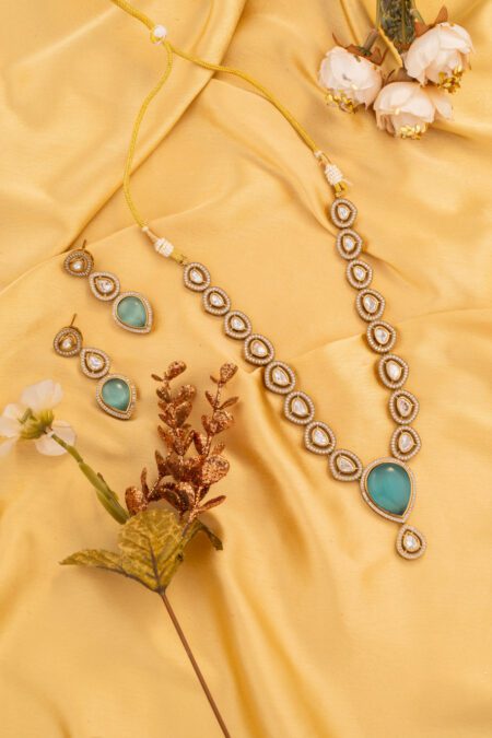 Sky Blue Mosiannite Gem Embellish the Gold Kundan set gives an aesthetic look