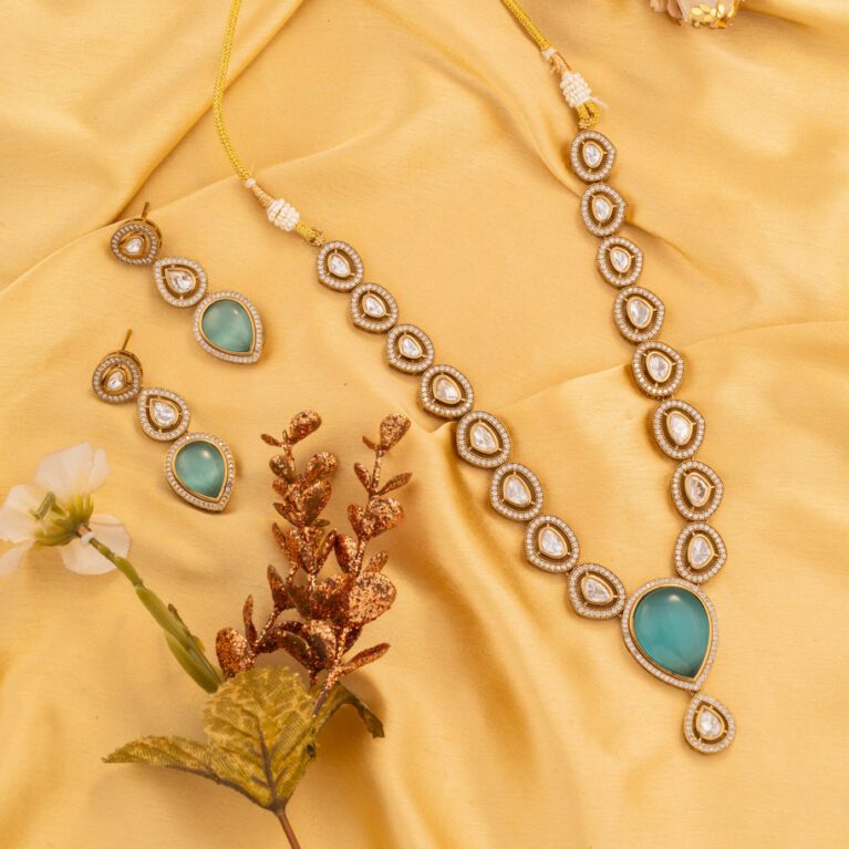 Sky Blue Mosiannite Gem Embellish the Gold Kundan set gives an aesthetic look