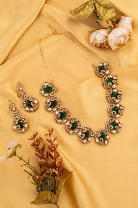 Green Stones with AD all over the set on Gold Polish