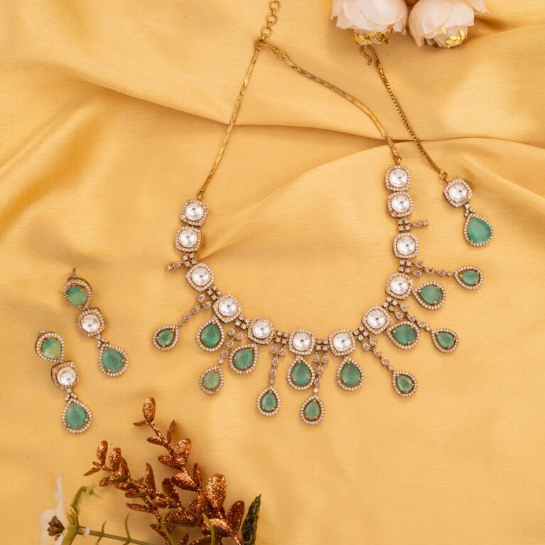 Hanging Aqua Blue Crystals On Gold Polish With perfectly crafted Kundan
