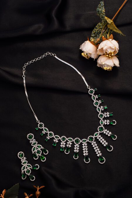 Green hanging crystals on White Gold AD string, gives sparkling looks on every occasion