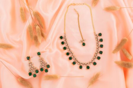 Green Square Crystal on AD with Gold polish gives a elegance