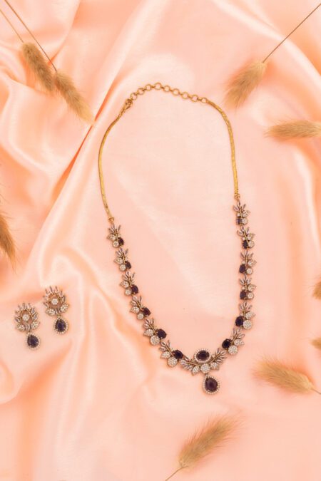 AD set with Purple Stones on Gold polish