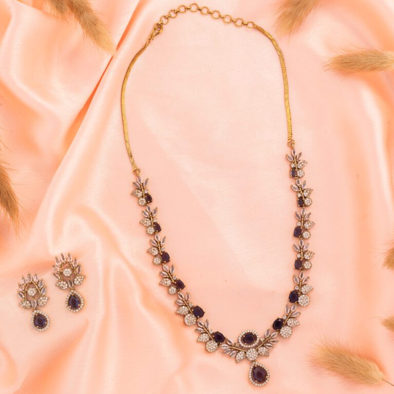 AD set with Purple Stones on Gold polish