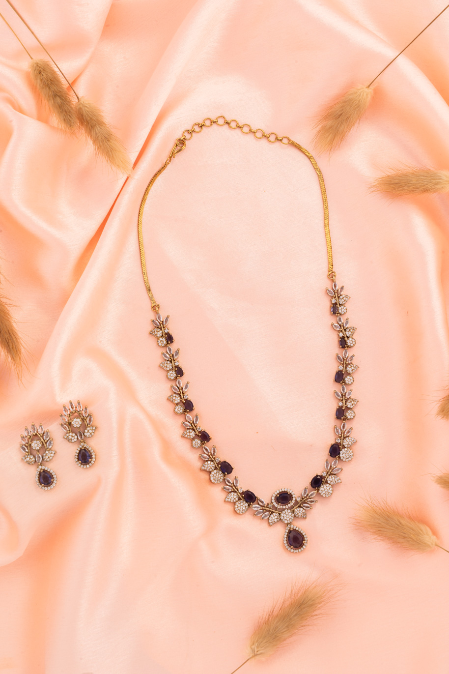 AD set with Purple Stones on Gold polish