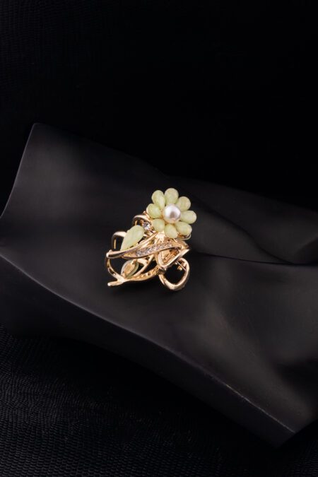 Pista Colored Pearl Flower embedded Golden Clutcher