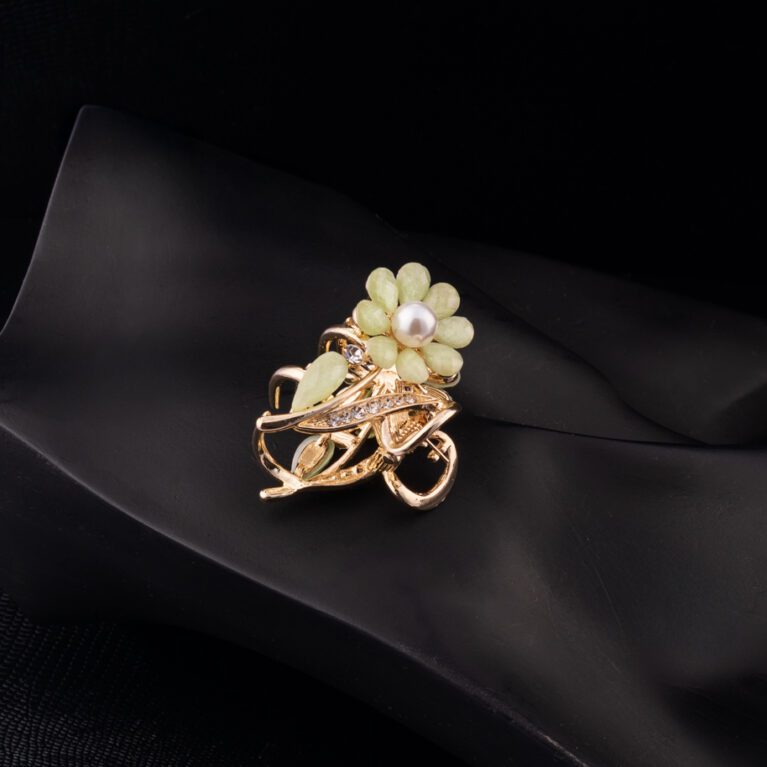 Pista Colored Pearl Flower embedded Golden Clutcher
