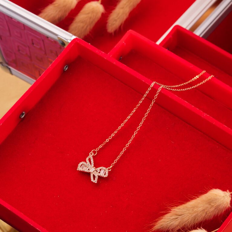 Bow Designed AD Necklace on Gold Chain